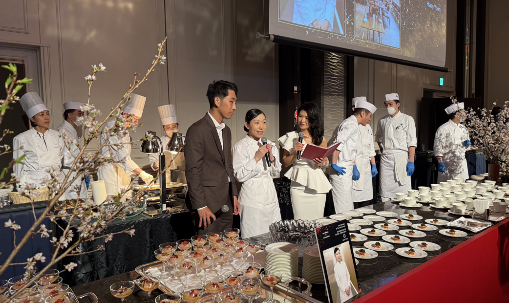 Chef from Jean-Georges at The Shinmonzen serving dishes during the cocktail party