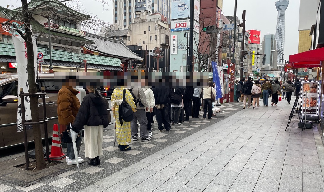 The long line outside a popular gyukatsu restaurant in Asakusa