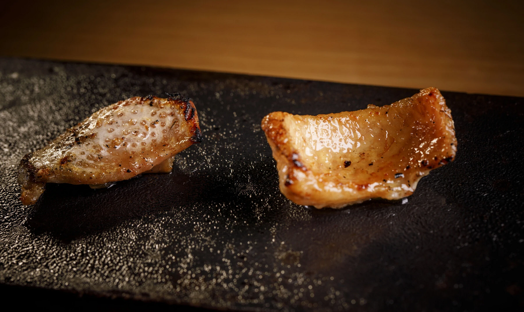 Japanese Yakitori on black stone plate