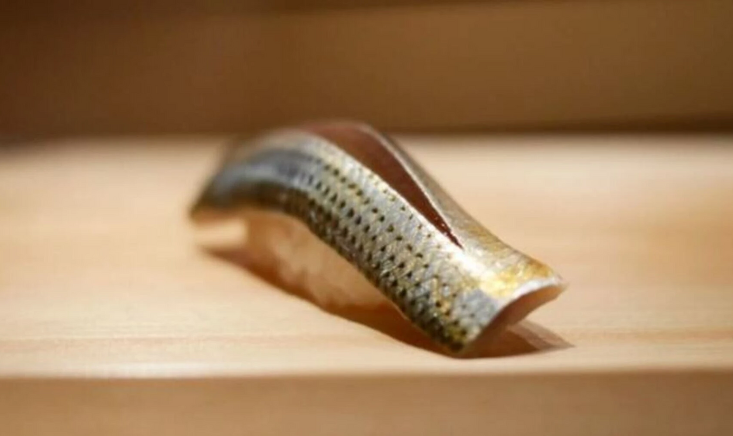 A traditional sushi on wooden plate