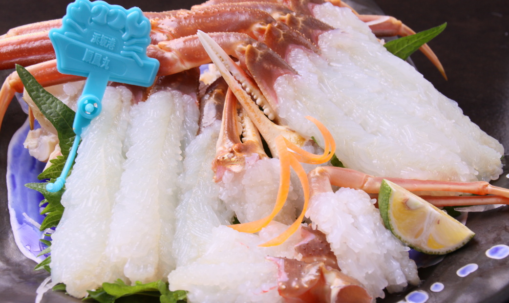 Crab Eating Raw as Sashimi