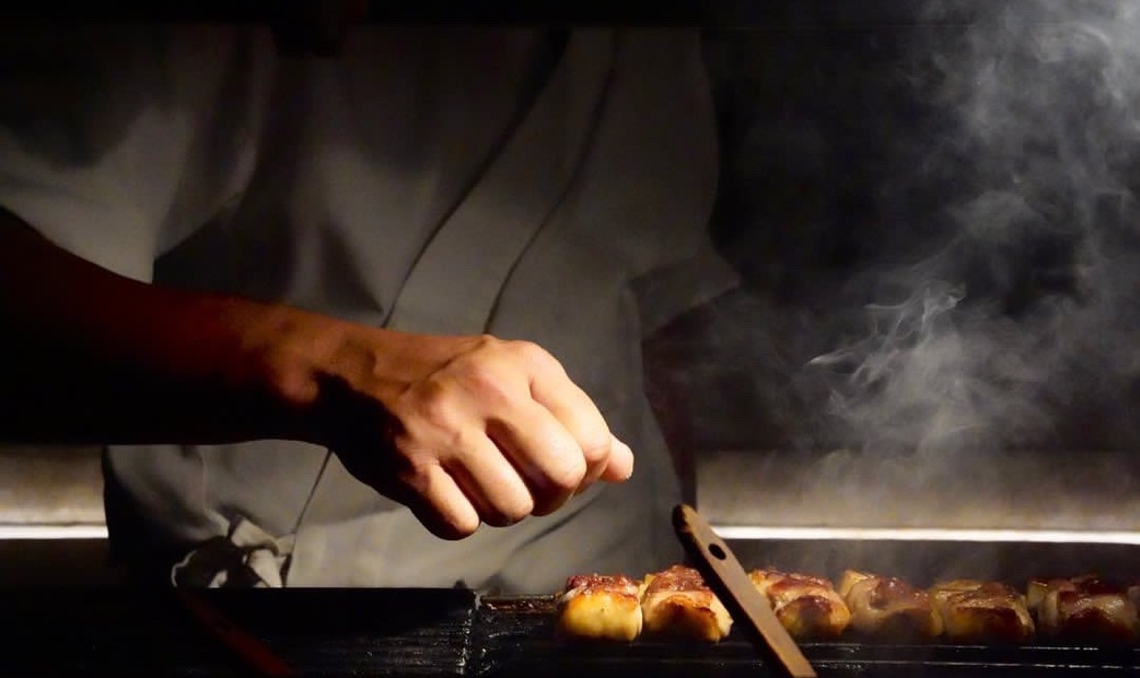 Cooking scene of Yakitori Matsuri