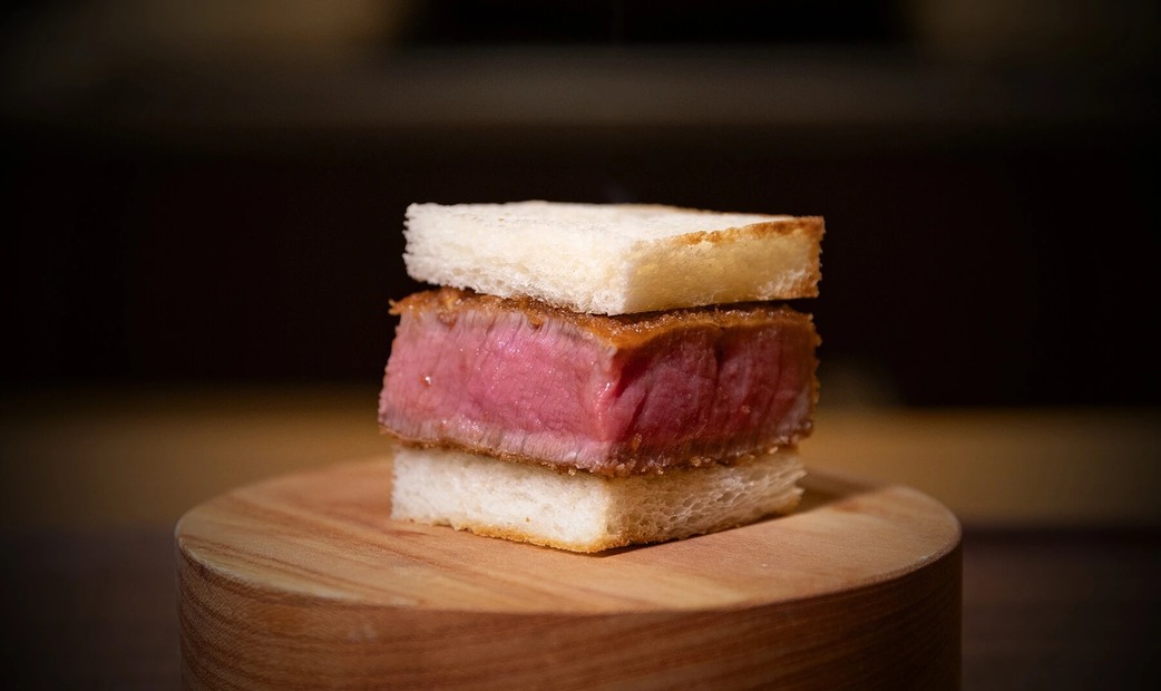 Beef sandwiched in bread.