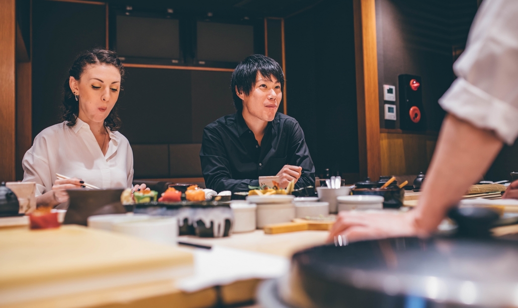 Guests enjoying a meal at the counter