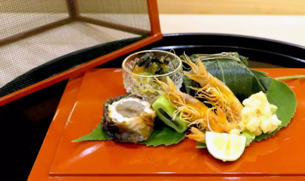 shrimp on a red plate