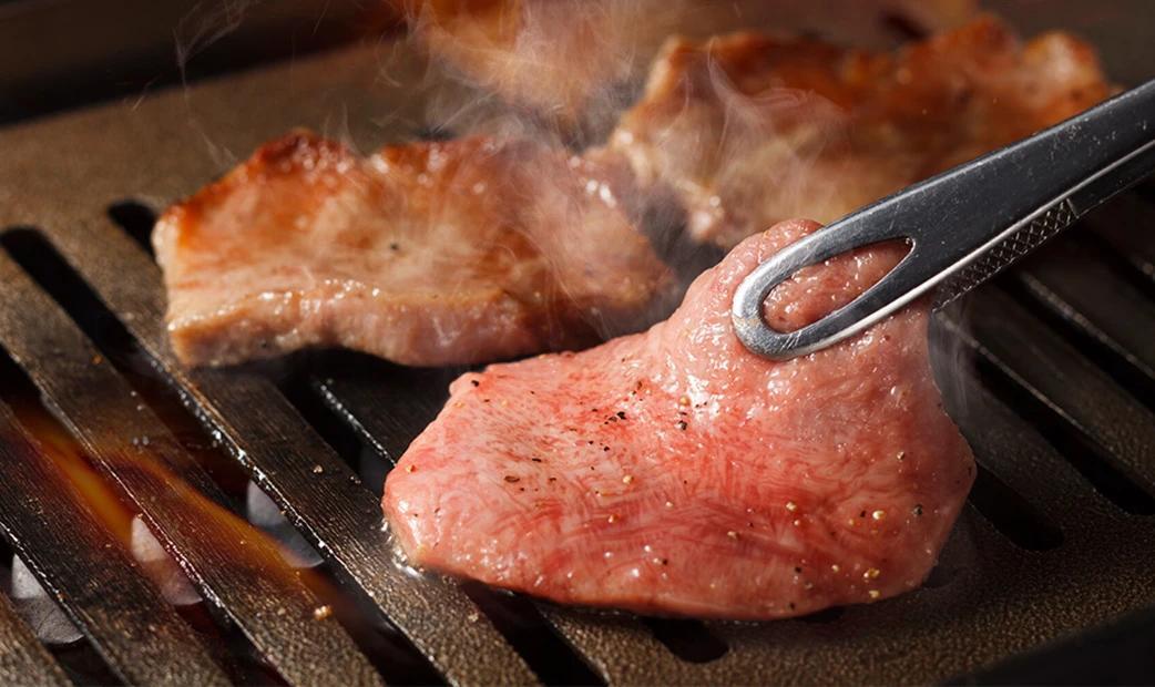 Close-up of meat being grilled on a barbecue